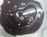A picture of step 2 of Pista custard pudding with almond chocolate pudding.