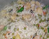A picture of step 7 of Aloo and Matar pulao.