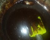 A picture of step 2 of Simple pudding with chocolate fudge with nuts melted.