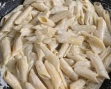A picture of step 4 of Quick and easy cheesy Penne Pasta.