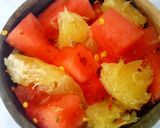A picture of step 5 of Orange Melon Chili Salad.