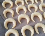A picture of step 6 of Sugar-Dusted Crescent Cookies.