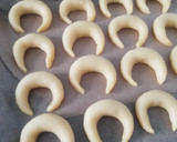 A picture of step 6 of Sugar-Dusted Crescent Cookies.