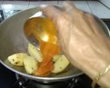 A picture of step 2 of Potato Rahu Fish Curry.