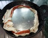 A picture of step 3 of Chitau Pitha with Coconut(Appam).