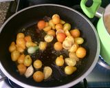 Foto del paso 3 de la receta: Rigatoni amarillos (tomatitos y flores de zucchini)