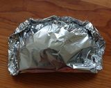 Foto del paso 3 de la receta: Pescado empapelado con brócoli y zanahoria en freidora de aire