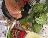 Foto del paso 1 de la receta Arroz caldoso con alcachofas, ajos tiernos y pollo