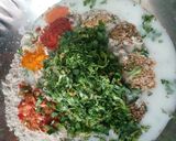 A picture of step 3 of Winter special Digestive Dhebri with leafy greens.
