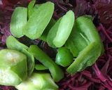 A picture of step 1 of Lal shak ar amda (red amaranth with hog plum or wild mango).