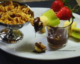 A picture of step 4 of Chocolate and Walnut Tutti Frutti Fondue.