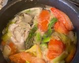 A picture of step 1 of Salmon Head Soup with Asparagus.
