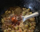 A picture of step 3 of Gajar Chunda oats beans aloo tikki fig chutney sandwich in Indian bread.