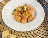 Foto del passaggio 4 della ricetta Calamarata di pesce spada con pesto di pomodori secchi