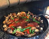 A picture of step 5 of Paella with Vegetables and Meat.