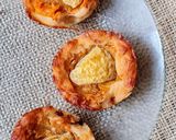 Foto del paso 4 de la receta: Empanadas abiertas o canastitas sin masa de harina, rellenas de zapallo, mandarina y nuez