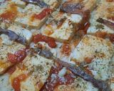 Foto del paso 7 de la receta: Pizza mitad anchoas, mitad olivas negras