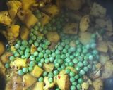 A picture of step 7 of Potato, cauliflower and pea curry - vegan.