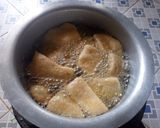 A picture of step 5 of Crunchy coconut Mandazi.