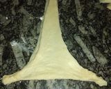 Foto del paso 11 de la receta: Medialunas con dulce de leche🥐