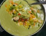 A picture of step 3 of Prawns thai green curry with boiled rice.