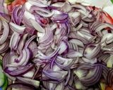 A picture of step 1 of Punjabi Thunder Onion Pakoras (fritters).