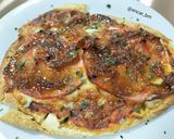 Foto del paso 5 de la receta: Pizza-naan de magreta y cebolla a la naranja en airfryer