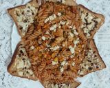 A picture of step 4 of Red sauce chicken pasta with garlic bread.