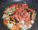 Foto del paso 2 de la receta: Arroz rojo con garbanzos y chorizo