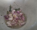 A picture of step 1 of Phodnicha rice.