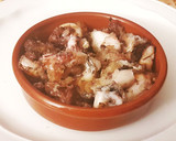 Foto del paso 6 de la receta: Calamarcitos Flambeados en aceite de oliva aromarizado con Ajo
