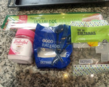 Foto del paso 1 de la receta: Palmeritas de hojaldre con azúcar, coco rallado y pasas
