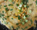 A picture of step 3 of Green onion moong dal chilla.