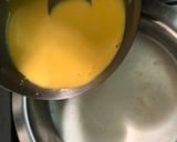 A picture of step 3 of Mango custard with gulab jamun.