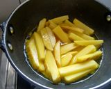 A picture of step 2 of Neem aloo fry.