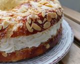 A picture of step 9 of Roscón de Reyes 2025 v2: With Almonds, Sugar, and Whipped Cream Filling.