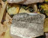 A picture of step 6 of Baked hake with Parmesan crumb, potatoes + leeks.
