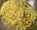 A picture of step 5 of Pasta with Bacon, Lemon and Pine Nuts.