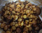 A picture of step 4 of Jhatpat khata meetha amla.
