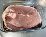 A picture of step 2 of Marinated Braised Pork Shoulder with Tomatoes and Bacon.