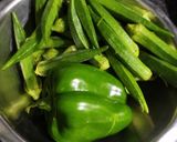A picture of step 1 of Bhindi capsicum sabji.