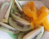 A picture of step 1 of Curd with fruits and honey.