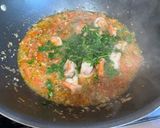A picture of step 4 of Garlic Tomato Shrimp Pasta.