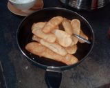A picture of step 29 of Sugar coat khaja.
