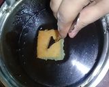 A picture of step 13 of Australian cake.. chocalate toping on vanilla cake.
