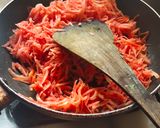 A picture of step 1 of Gajar halva.