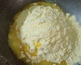 A picture of step 2 of Rava besan dry fruit laddu.