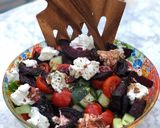 A picture of step 4 of BBQ beetroot and goats cheese salad.