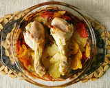 Foto del paso 7 de la receta: Muslitos de pollo al horno con patatas y verduras