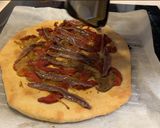 A picture of step 3 of Coca de Escalivada with Anchovies.